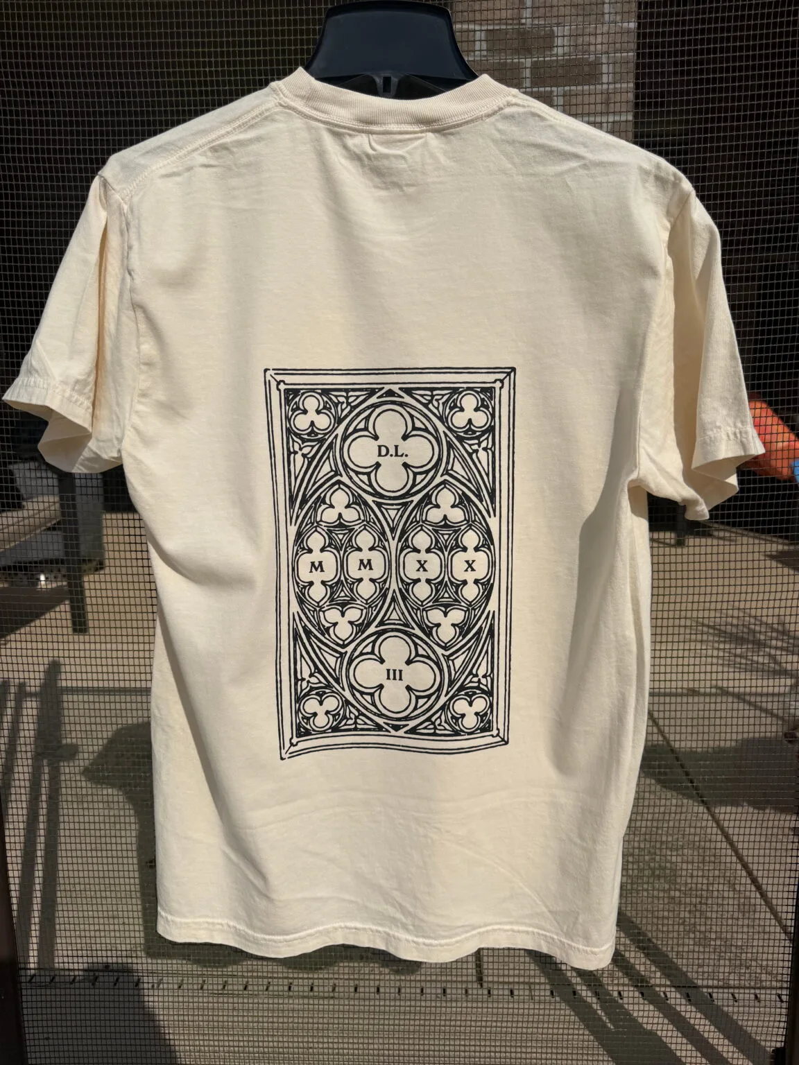 Dylan LeBlanc tarot card design printed on the back of an ivory shirt