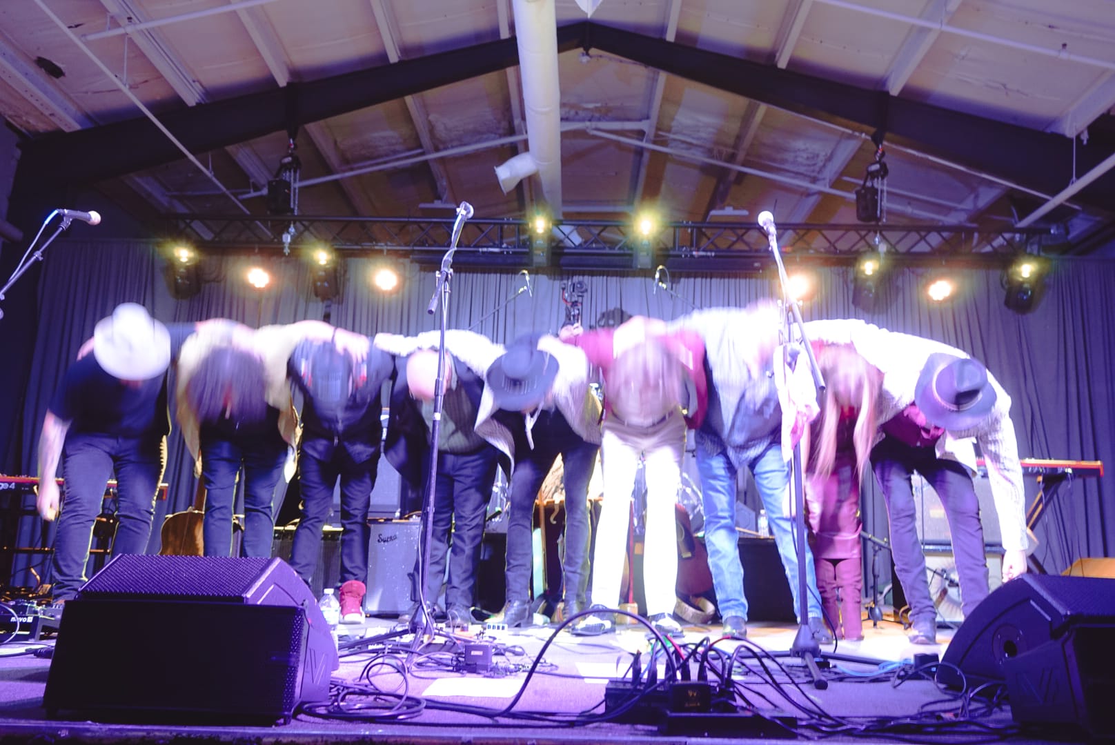 The Family taking a bow together at the end of the May 2 live recording