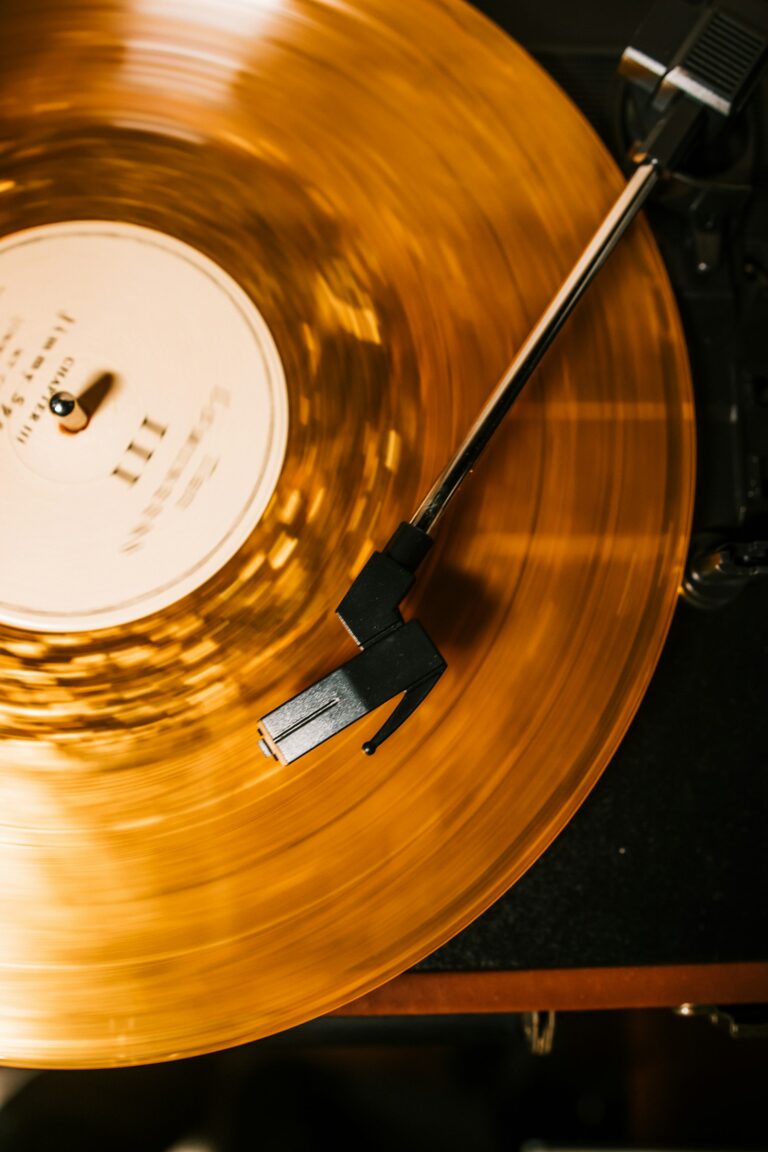 Amber vinyl record spinning on a turntable